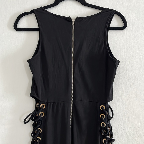 Sexy black jumpsuit with grommets down legs - Picture 7 of 7